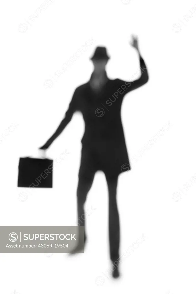 Silhouette of a man with a hat.