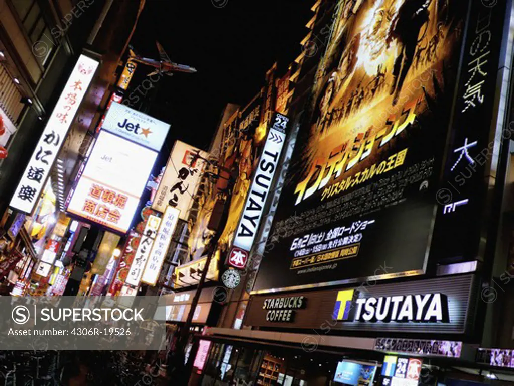 Advertising signs in a big city at night, Japan.