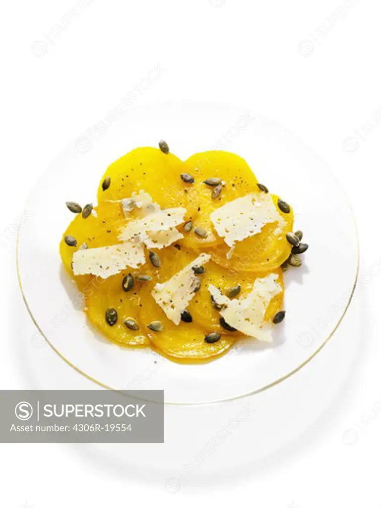 Yellow beet with seeds of pumpkin and slices of cheese, Sweden.