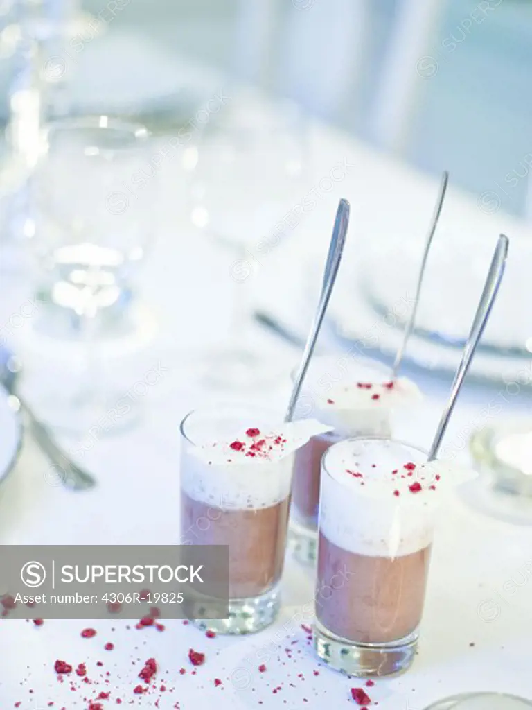 Dessert in glasses on a white table, Sweden.