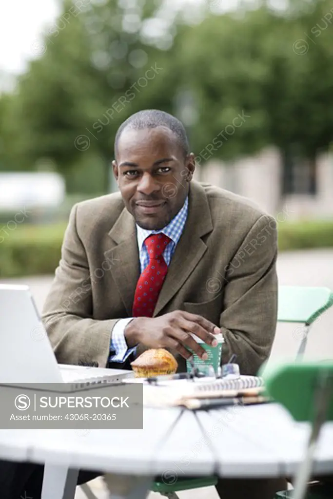 A businessman using a laptop, Stockholm, Sweden.