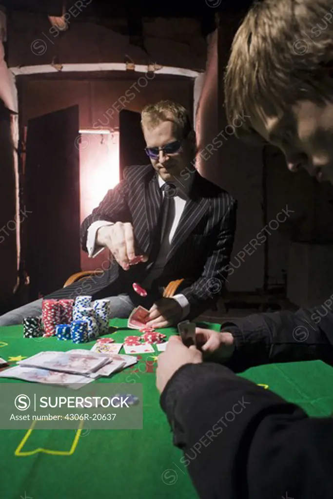 Magician playing poker, Sweden.