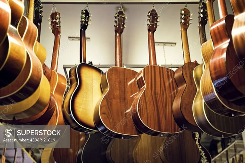 Guitars hanging in a shop, Sweden.