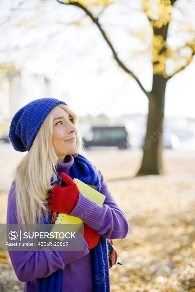 A female student in autumn, Sweden.