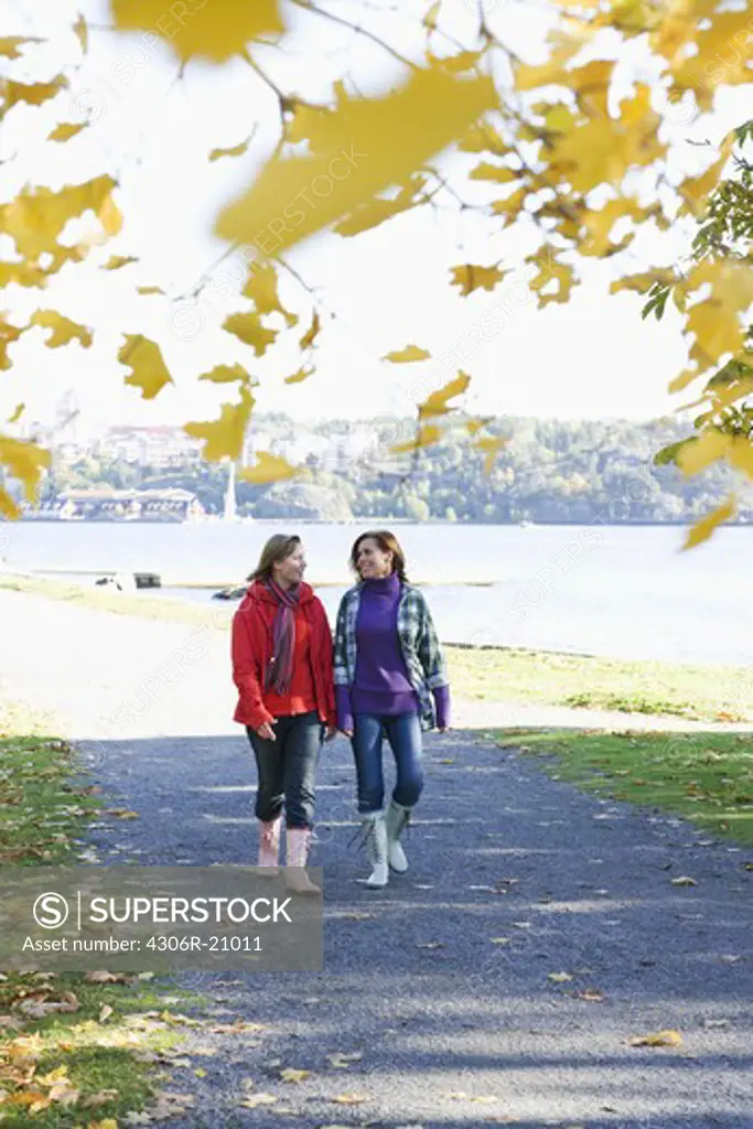Mother and daughter taking a walk, Sweden.