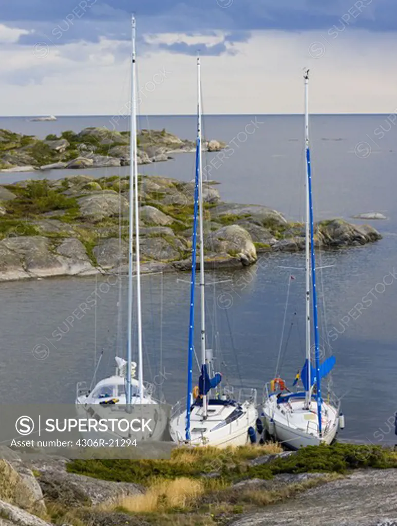 Sailing-boats moored in Stockholm archipelago, Sweden.