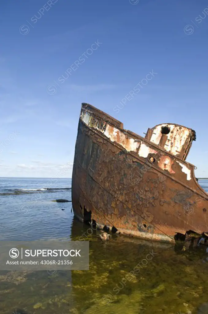 Shipwreck in polluted water