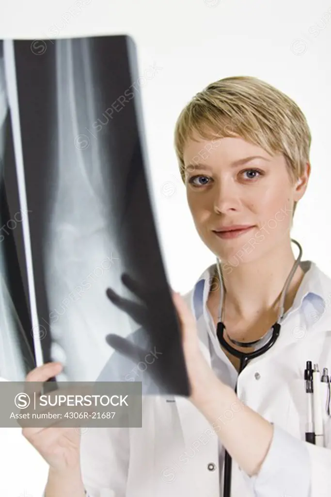 A female doctor holding an X-ray plate, Sweden.