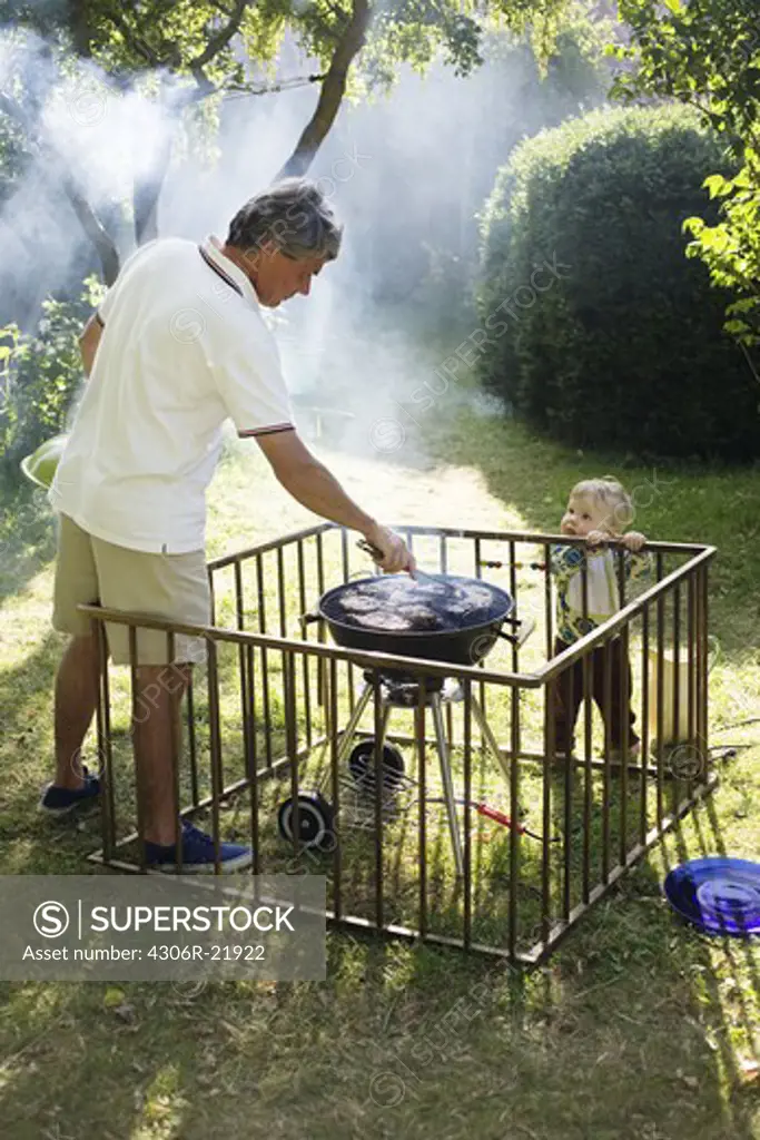A man barbecuing, Sweden.