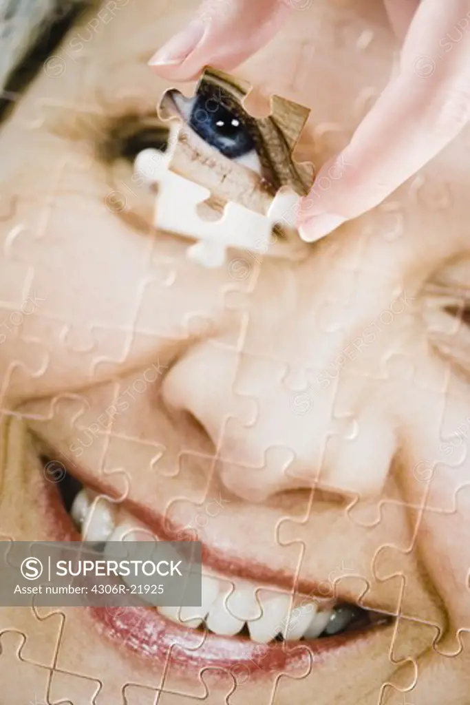 A puzzle with the image of a woman.
