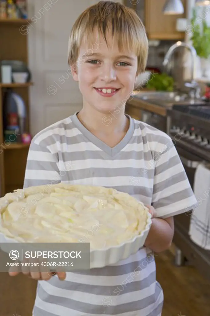 Boy in a kitchen, Sweden.