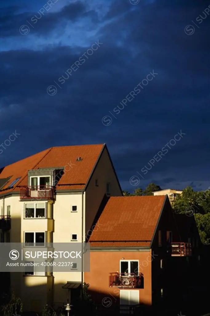 A block of flats against a blue sky, Sweden.
