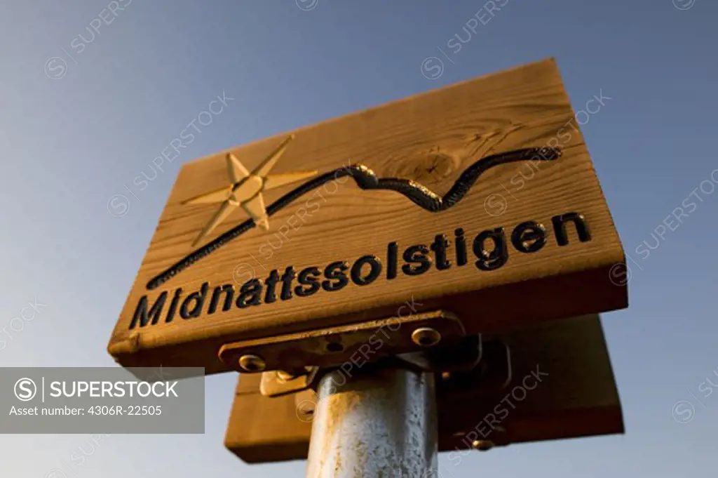 A wooden sign against the sky, Sweden.
