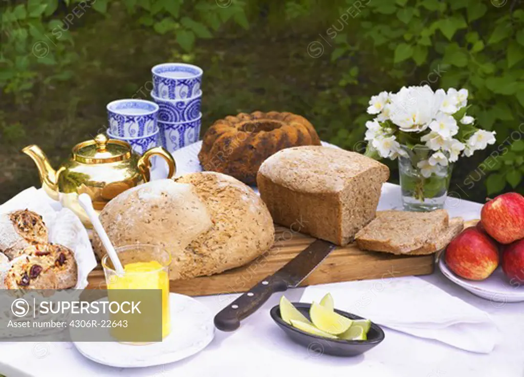 Bread and cakes on outdoors table