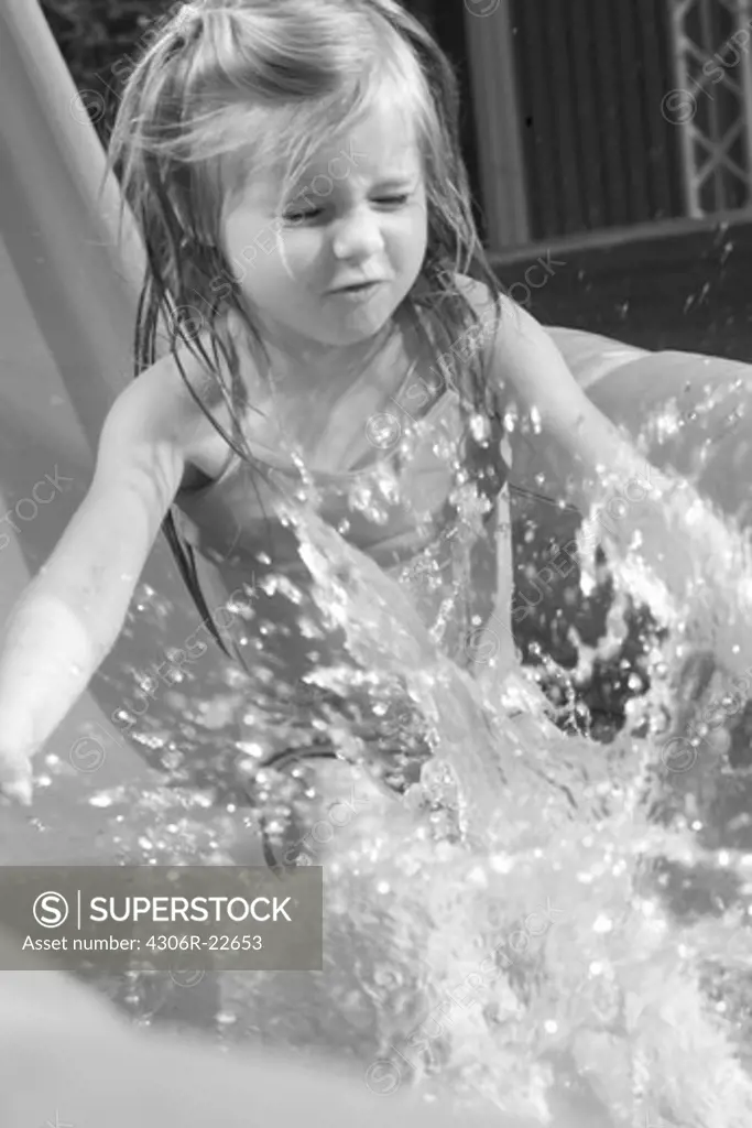 Girl playing in a swimming-bath, Sweden.