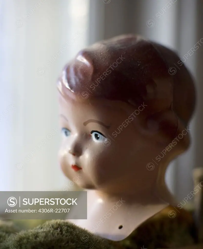 A dolls head, close-up, Sweden.
