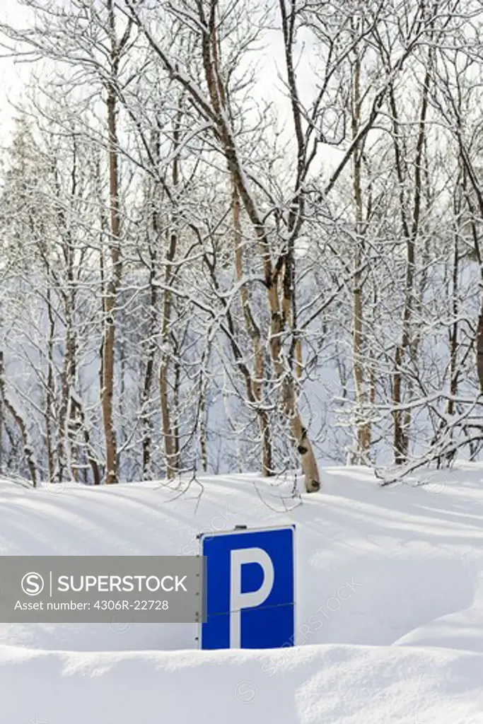 A parking sign hidden in the snow, Sweden.