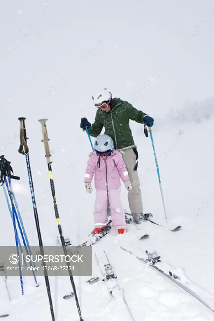 Mother and daughter skiing, Sweden.