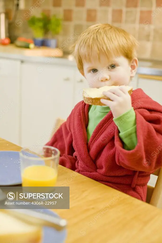 A little boy having breakfast, Sweden.