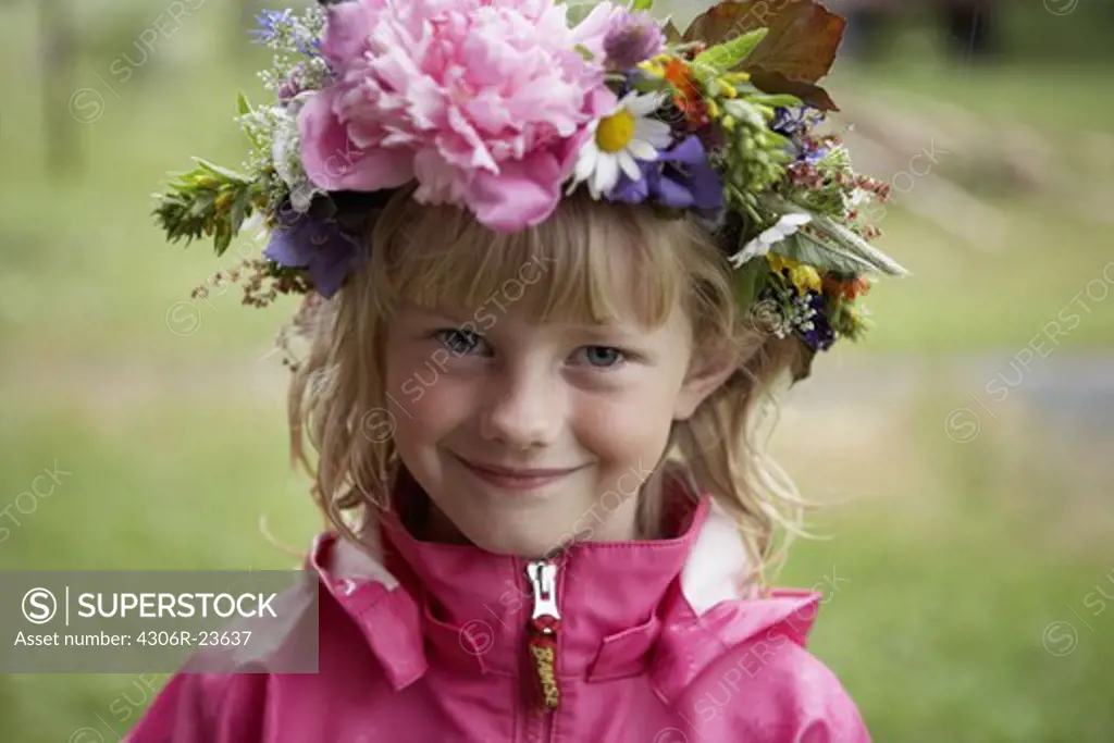 Girl with a wreath of flowers in her hair, Sweden.