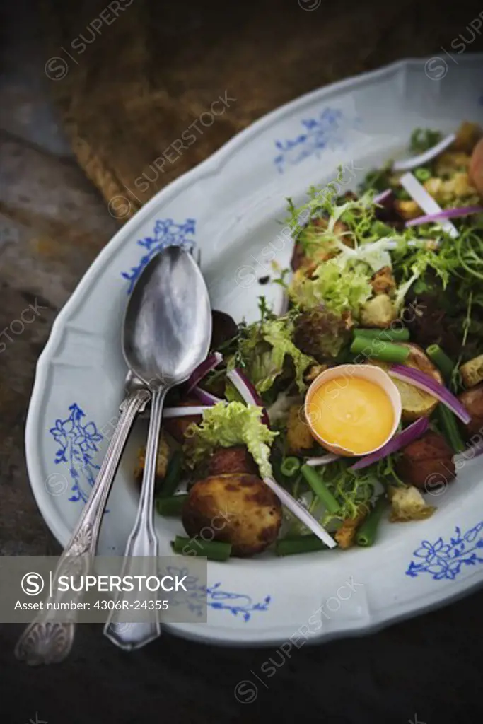 Salad with potatoes and egg yolk, Sweden.