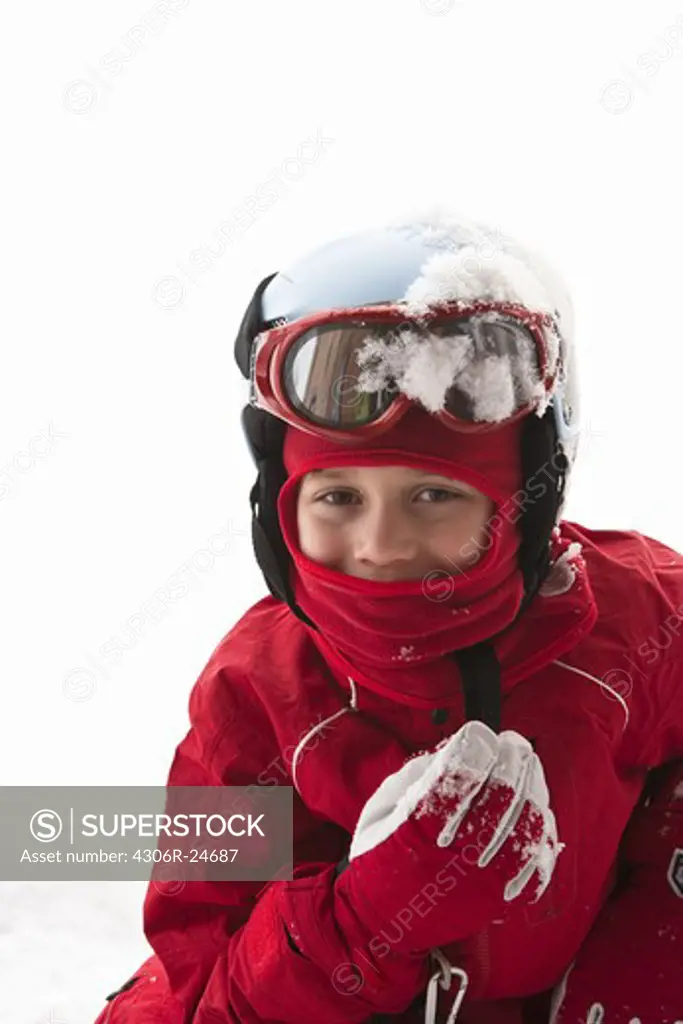 Boy playing on snow