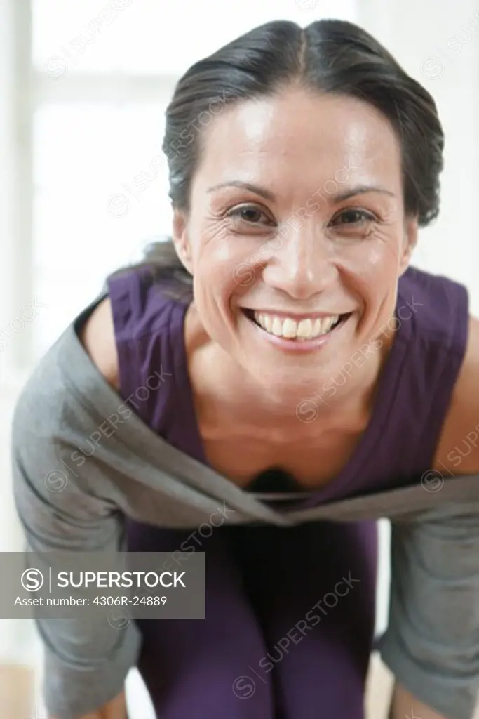 Portrait of beautiful smiling woman exercising