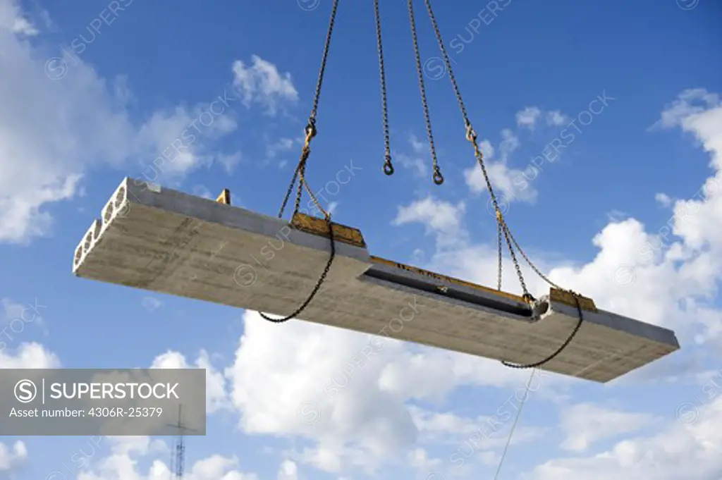 Concrete slab being lifted by crane