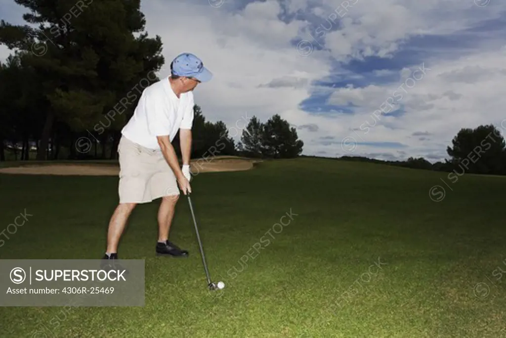 Male golfer on golf course