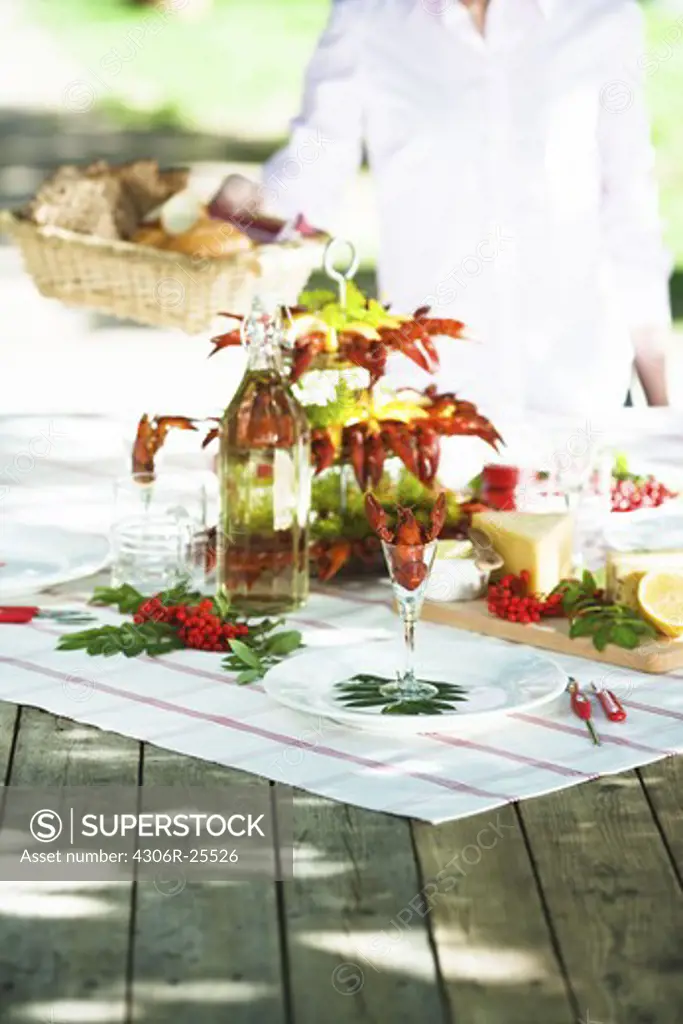 Meal with crayfishes on outdoor table