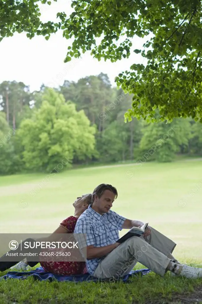 Young couple relaxing in park