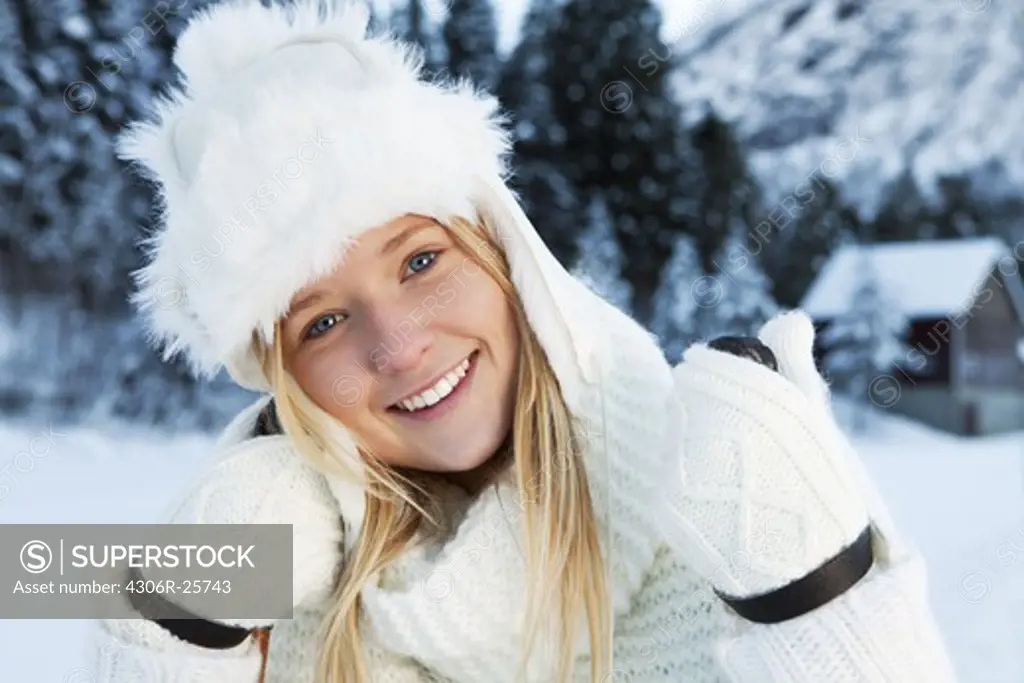 Portrait of girl wearing winter clothes, outdoors