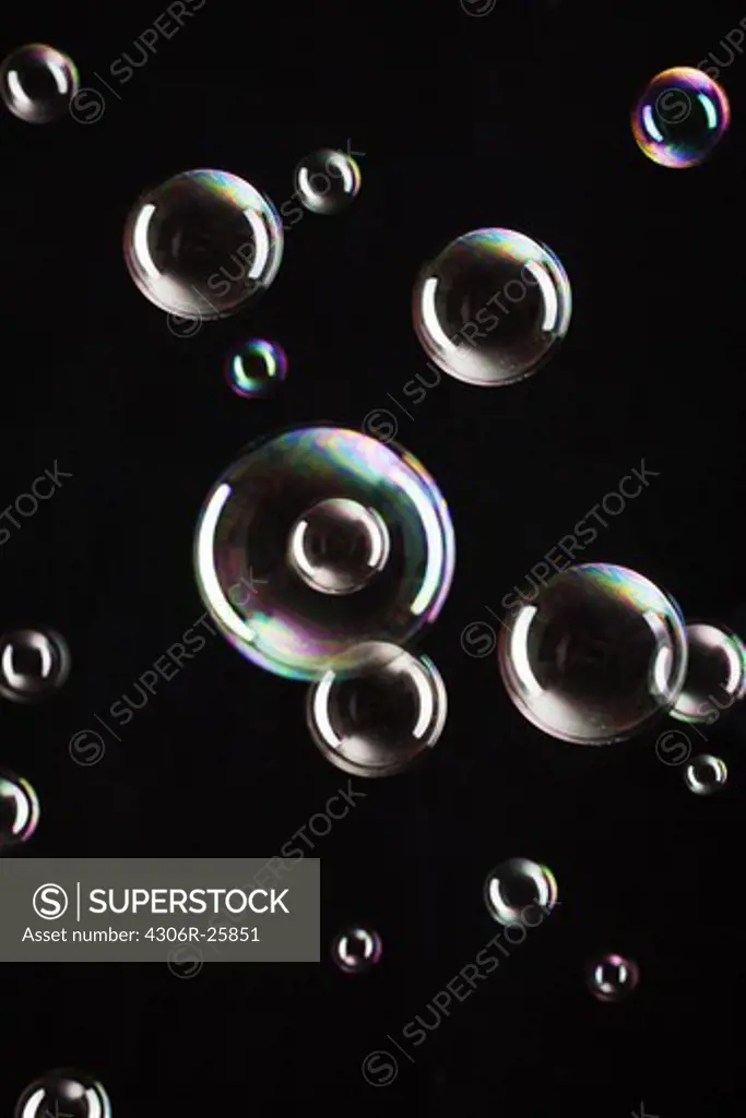 Soap bubbles on black background