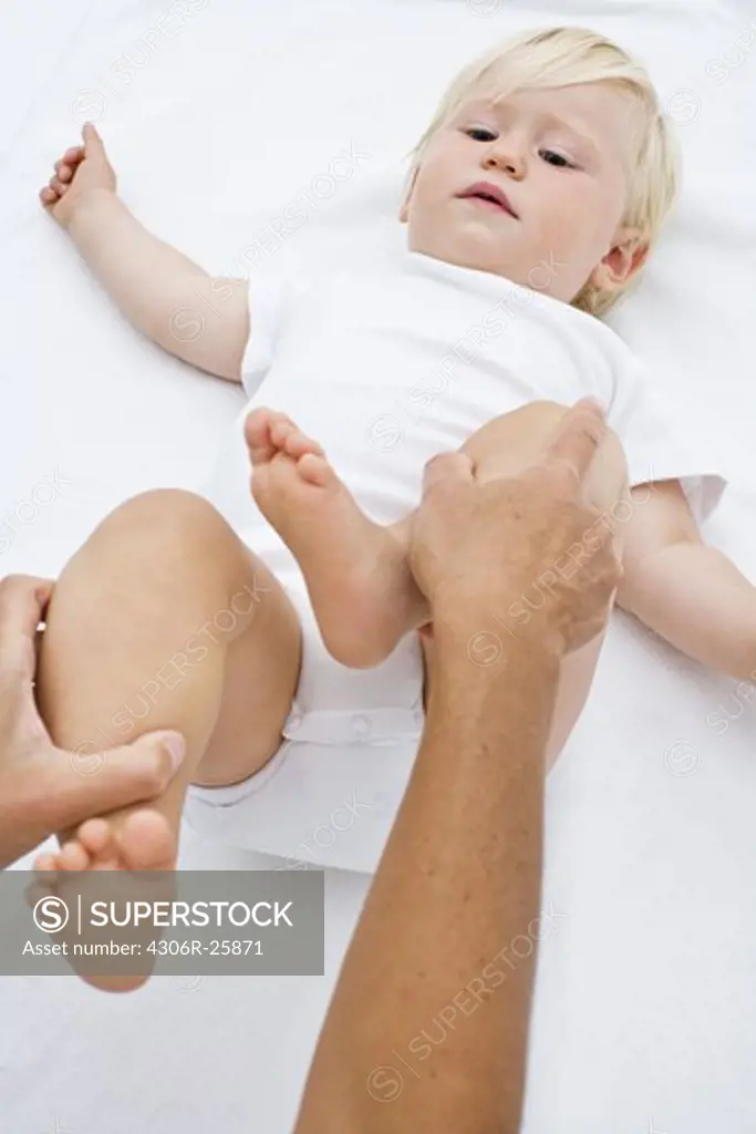 Baby boy having massage