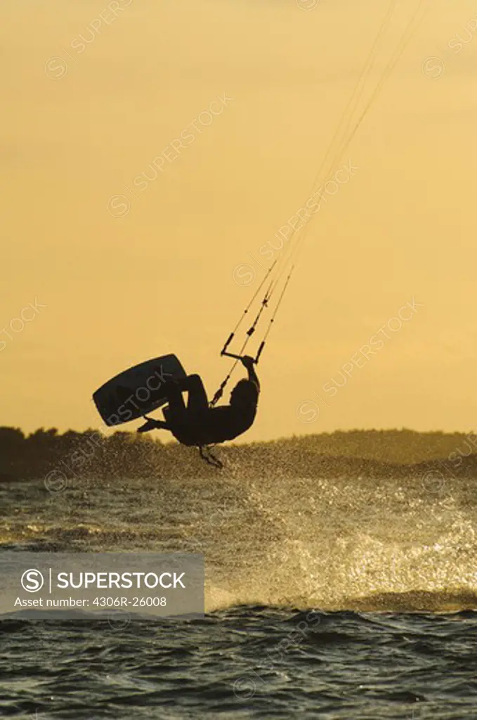 Kite surfing at dusk
