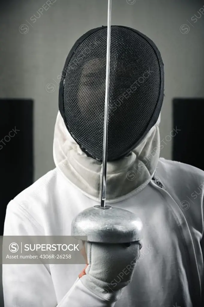 Portrait of fencer wearing face guard