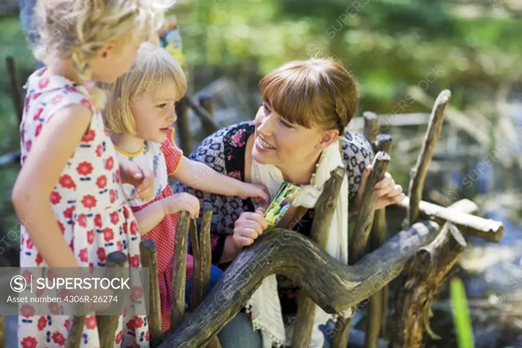 Mother with daughters at zoo