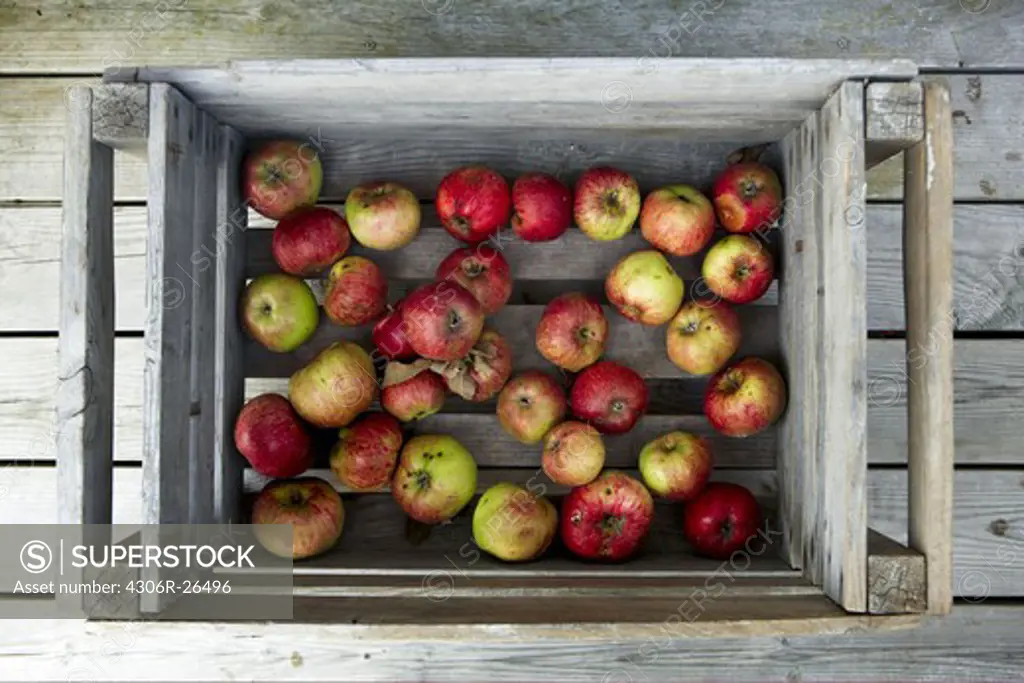 Apples in wooden box