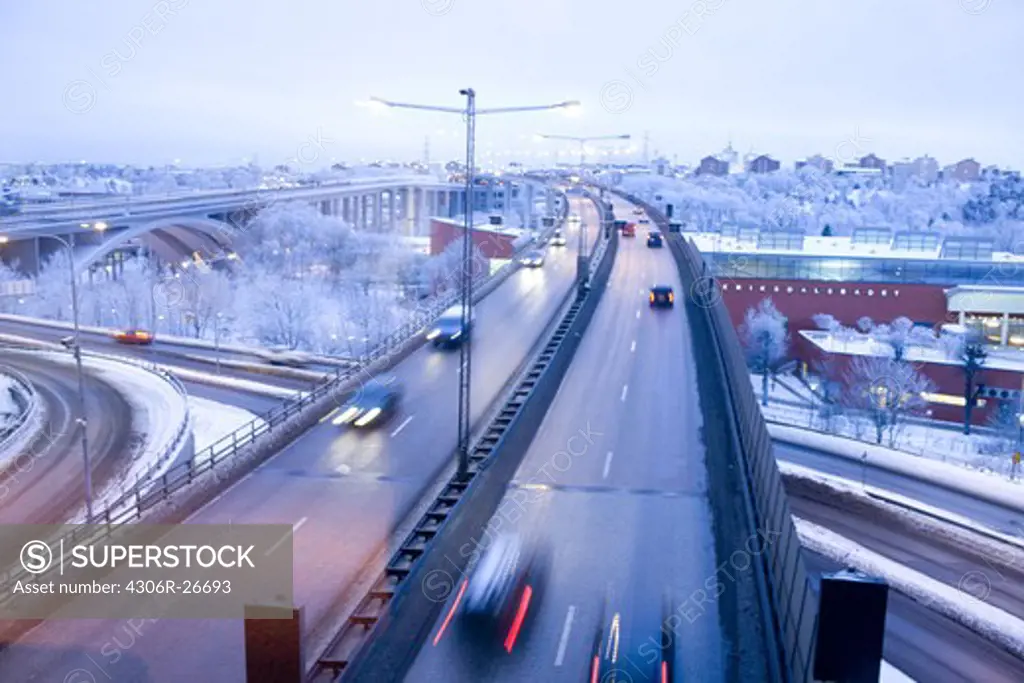 Traffic on elevated road at dusk