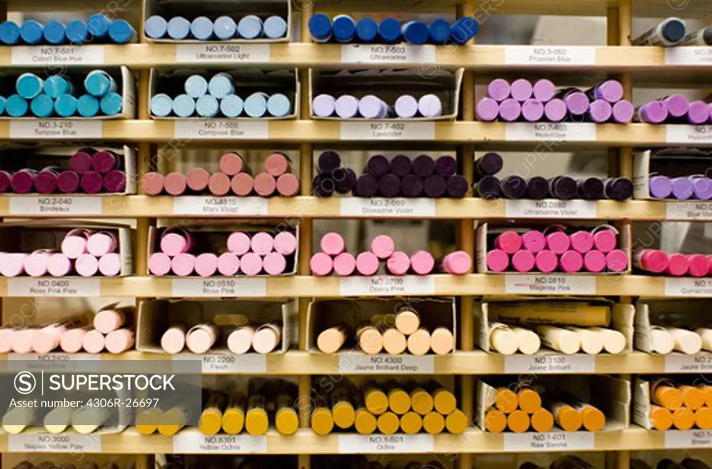 Multi coloured chalks in shelf