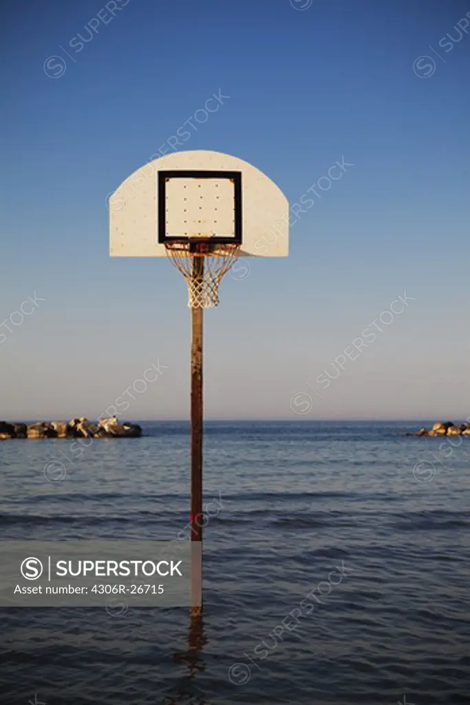 Basketball hoop in middle of sea