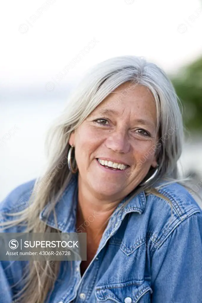 Mature woman smiling to camera