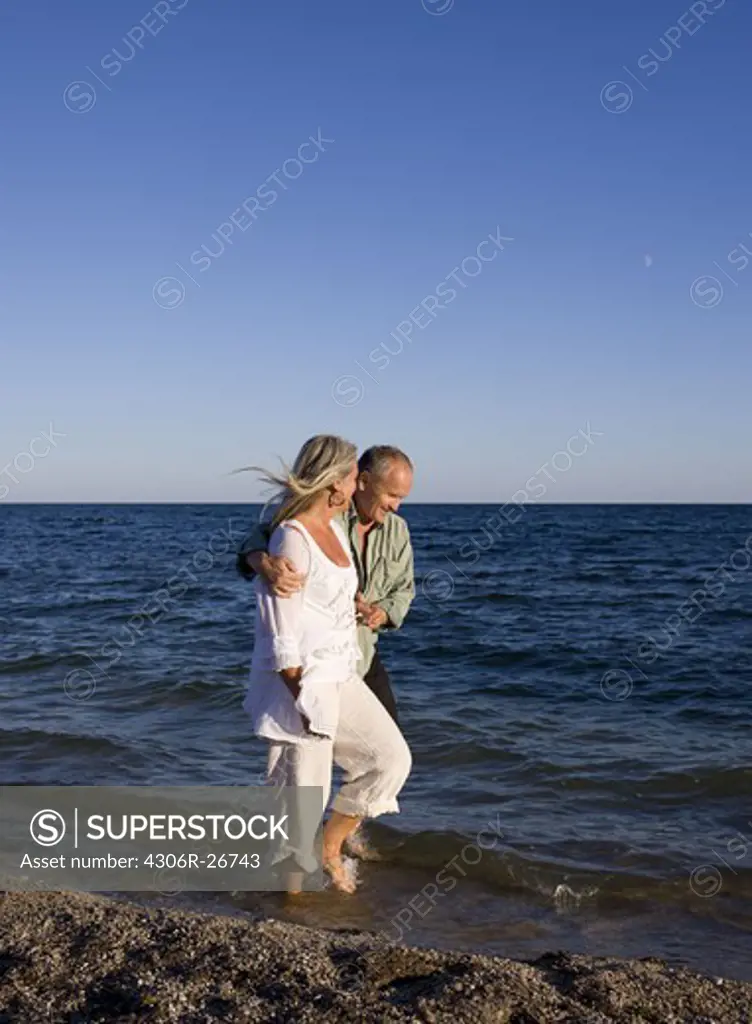 Mature couple on beach