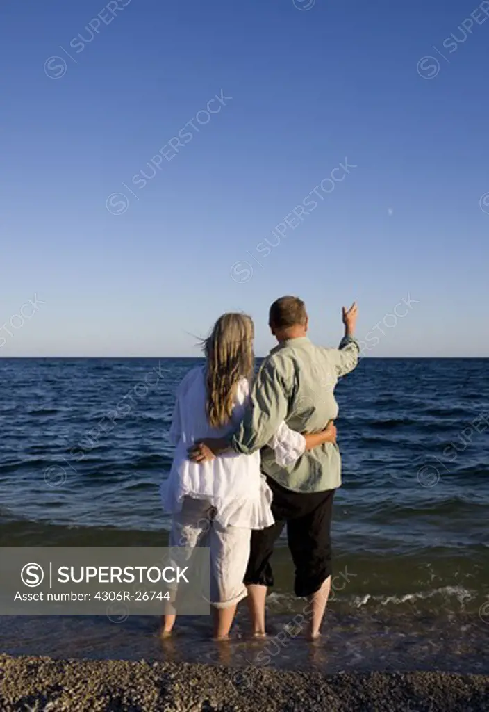 Mature couple on beach