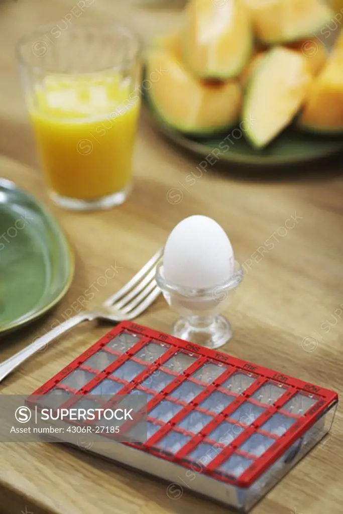 Medicine and egg for braekfast, Sweden.