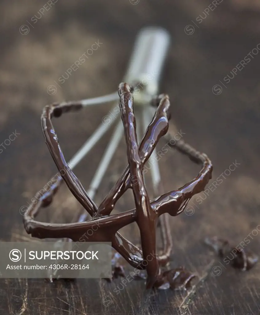 Sticky chocolate on whisk