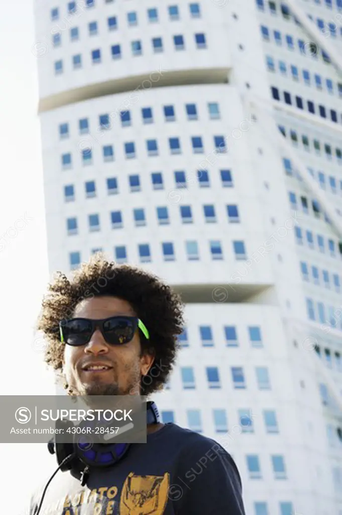 Portrait of man in front of Turning Torso building