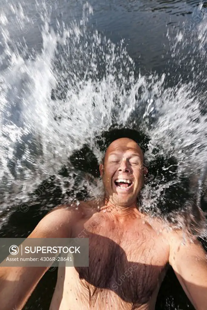 Man splashing into water
