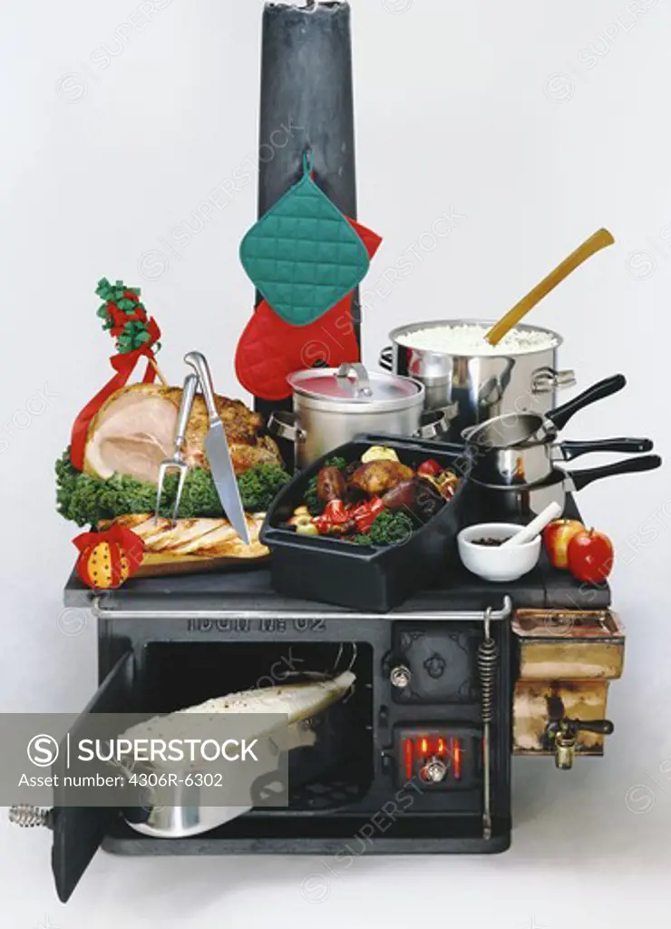 Cooking utensils with oven and food items for Christmas