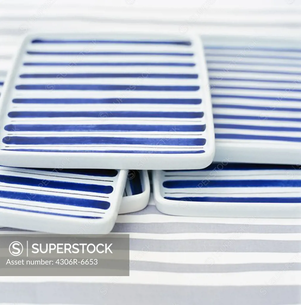 Stack of white and blue trays